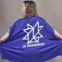 Lisette wearing her Writer In Residence cape