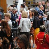 An image captured at the opening of Creative Future's online shop at Brighton Dome. The Mayor, Dominique De-LIght (Director of Creative Future) and local artists Yvonne J Foster are pictured speaking to the crowd at the exhibition launch.